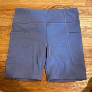 Athleta girl biker shorts in purple